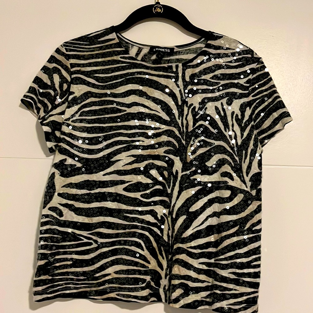 Dressy top. Sequined zebra print.